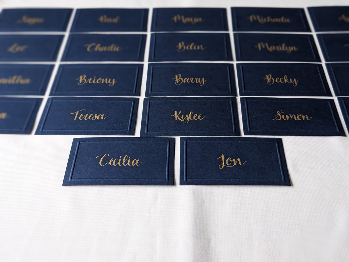Embossed card place names