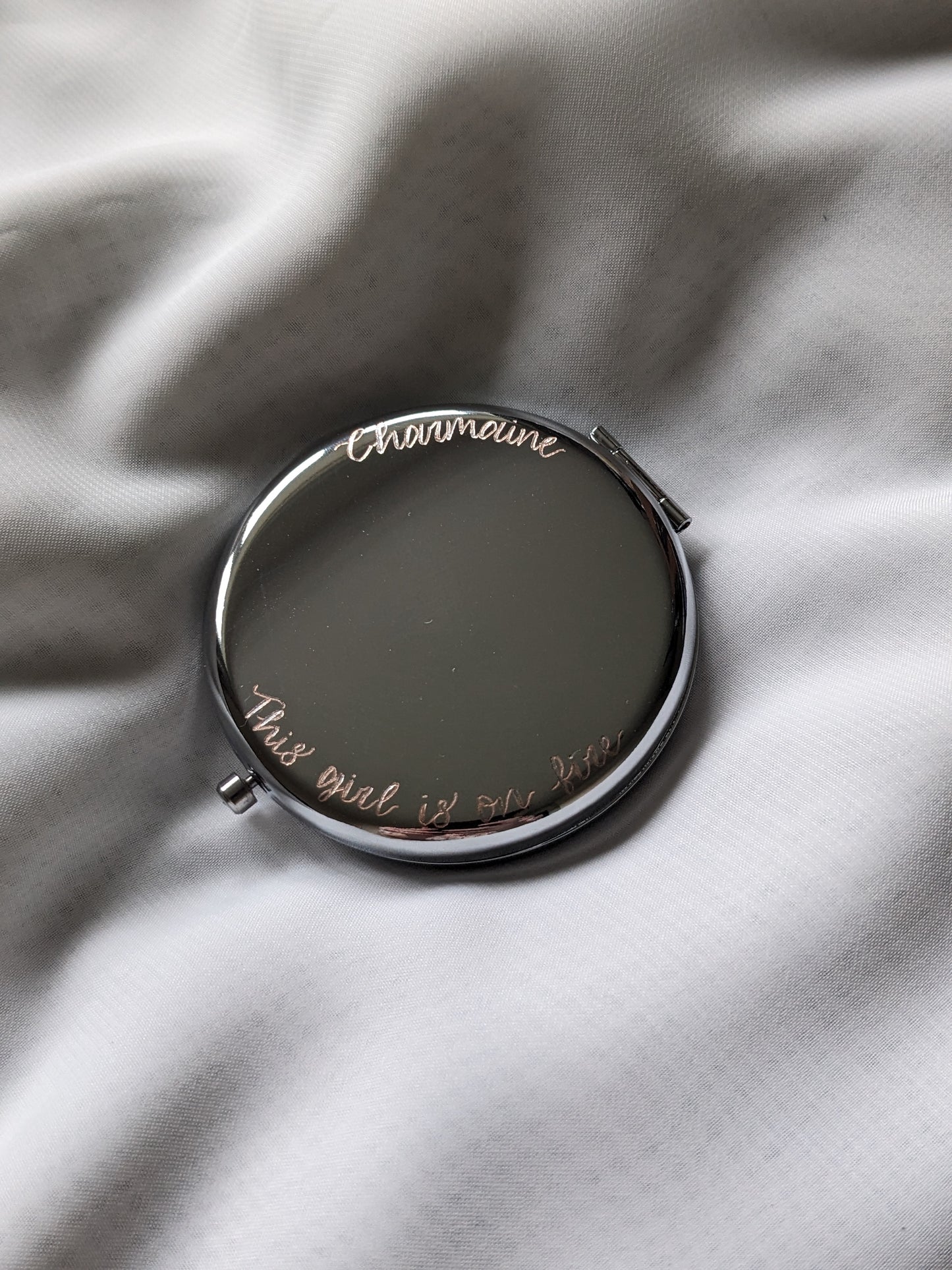 Engraved compact mirror