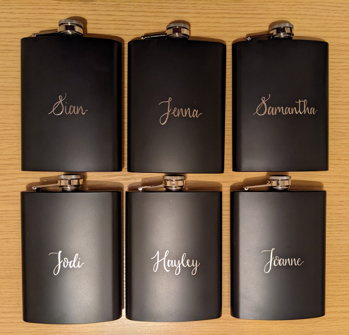Engraved hip flasks