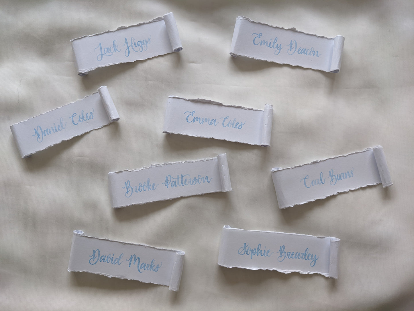 Deckled edge scroll place names