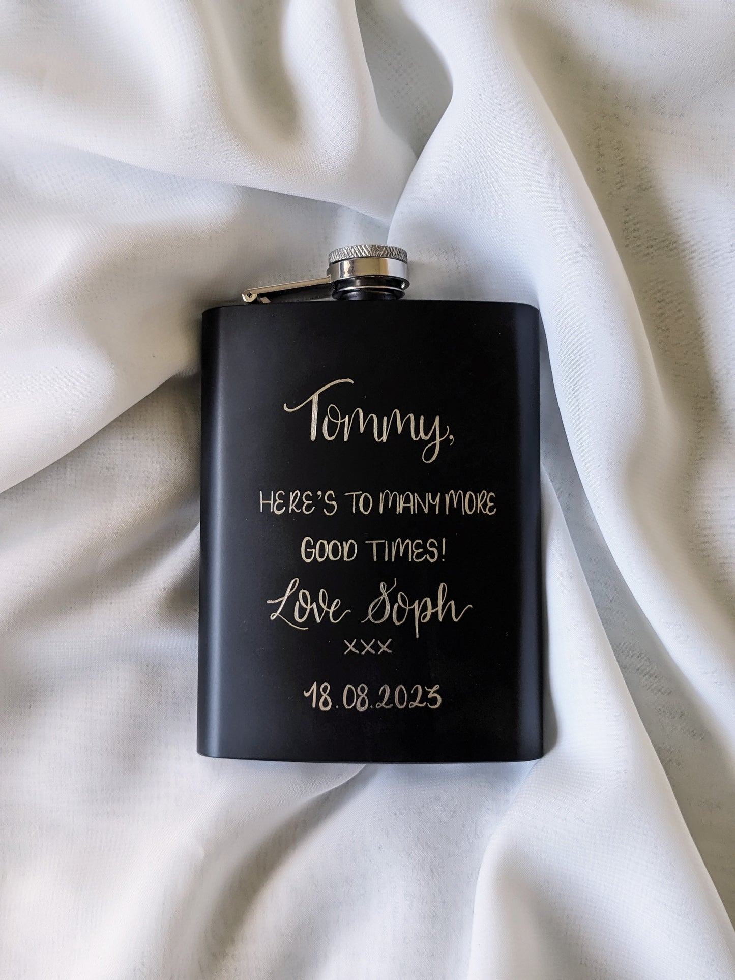 Engraved hip flasks
