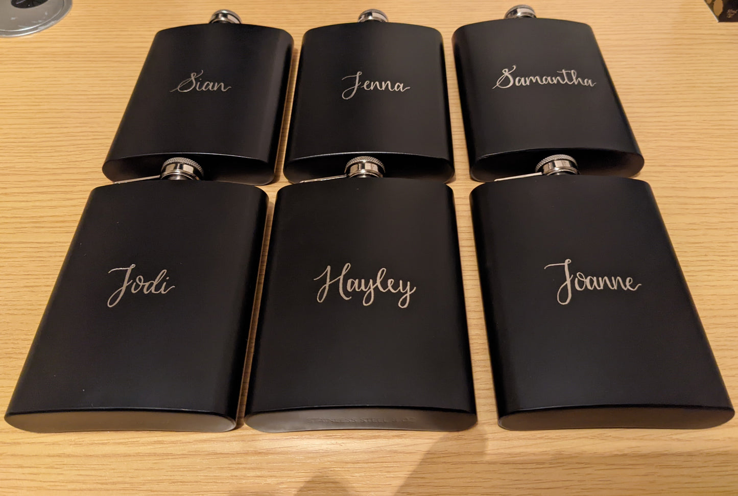 Engraved hip flasks