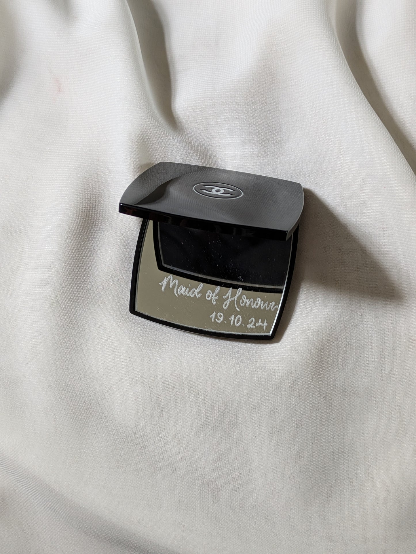 Engraved Chanel compact mirror