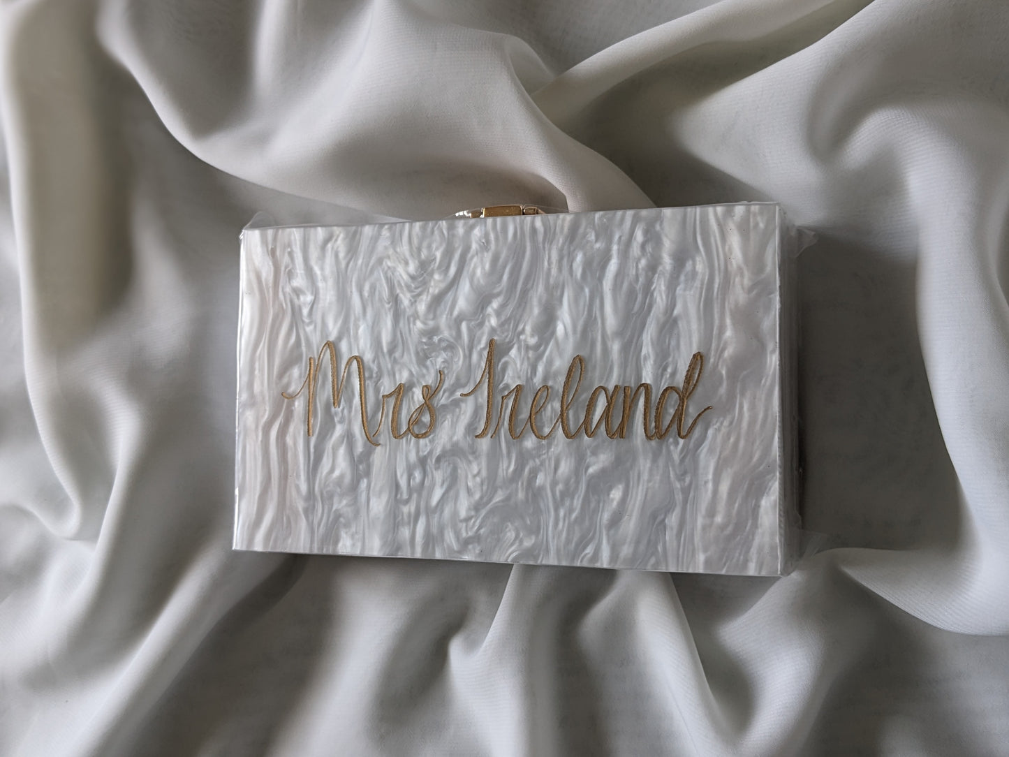 Engraved acrylic clutch