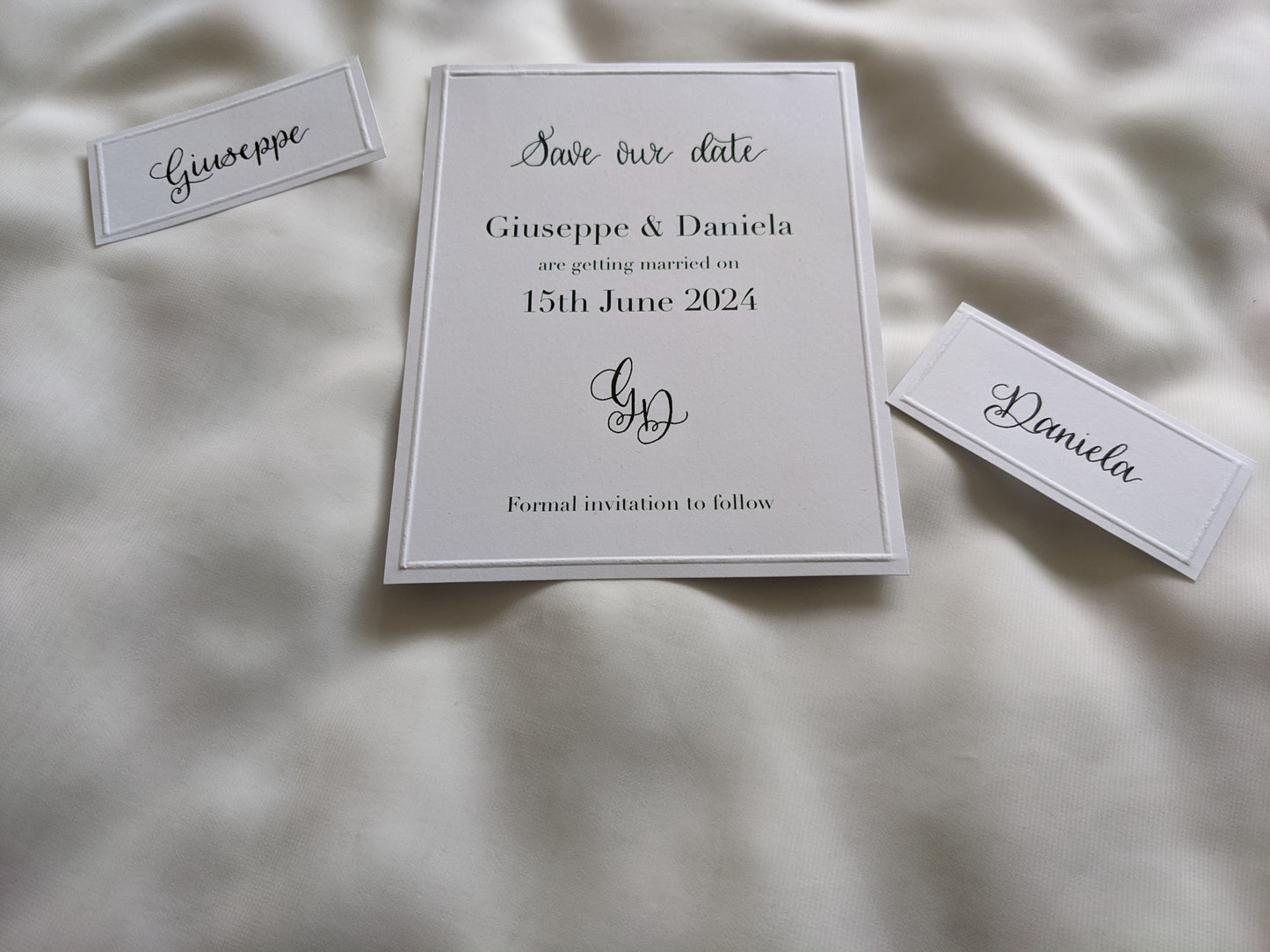 Embossed card place names