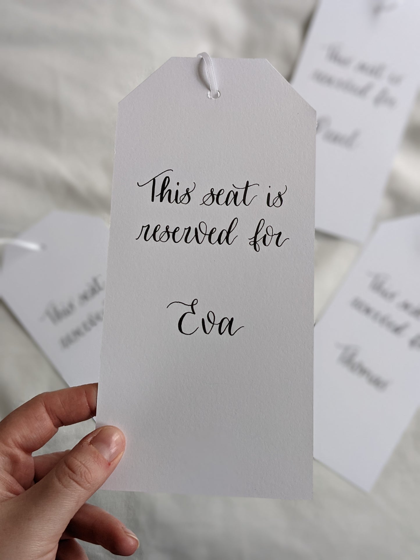 Reserved seat hanger tag