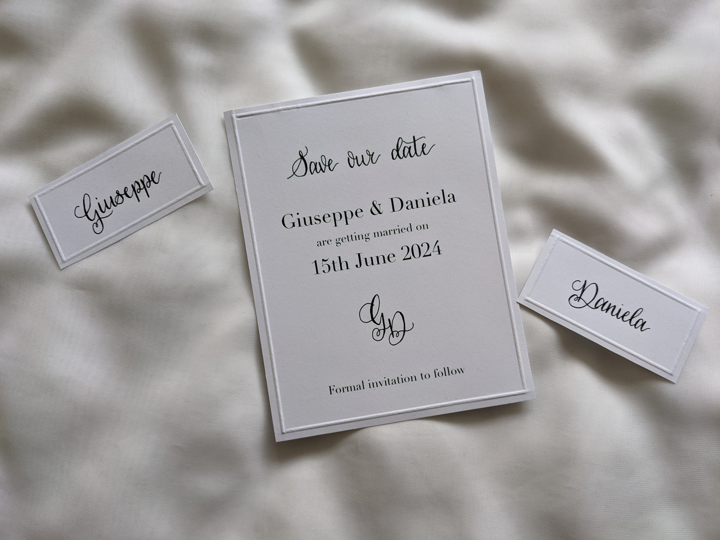 Embossed card place names