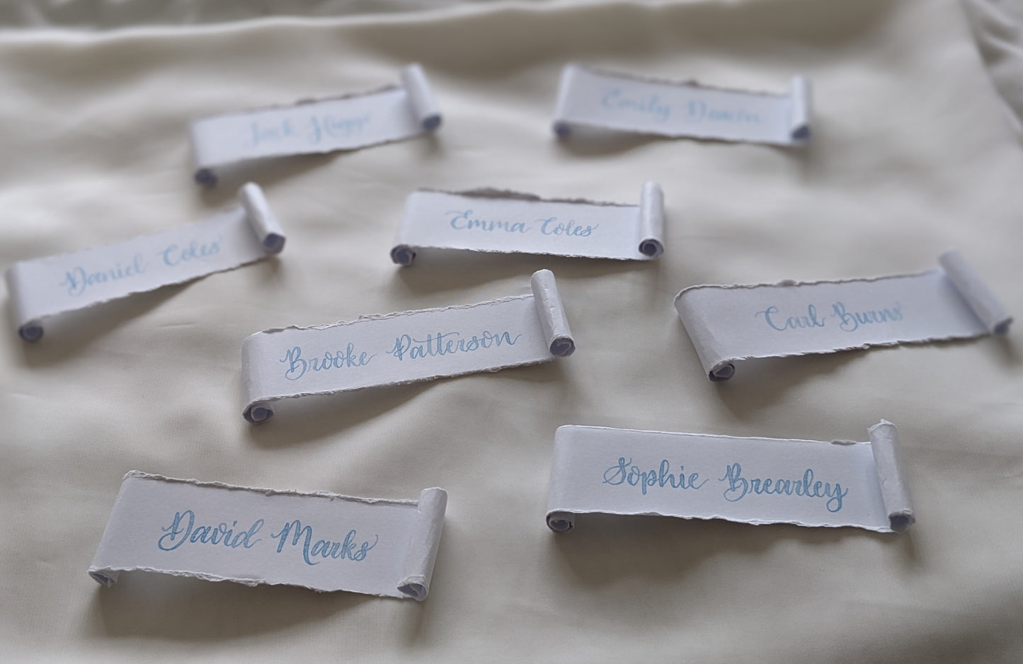 Deckled edge scroll place names