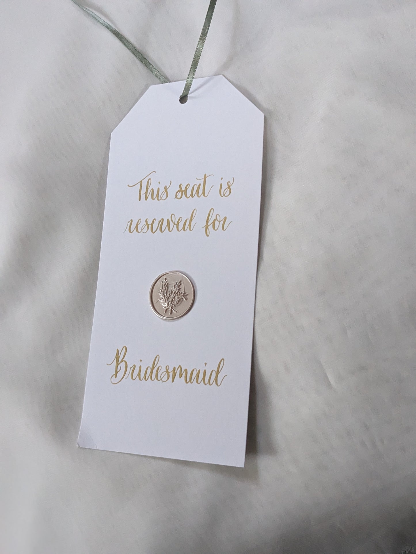 Reserved seat hanger tag