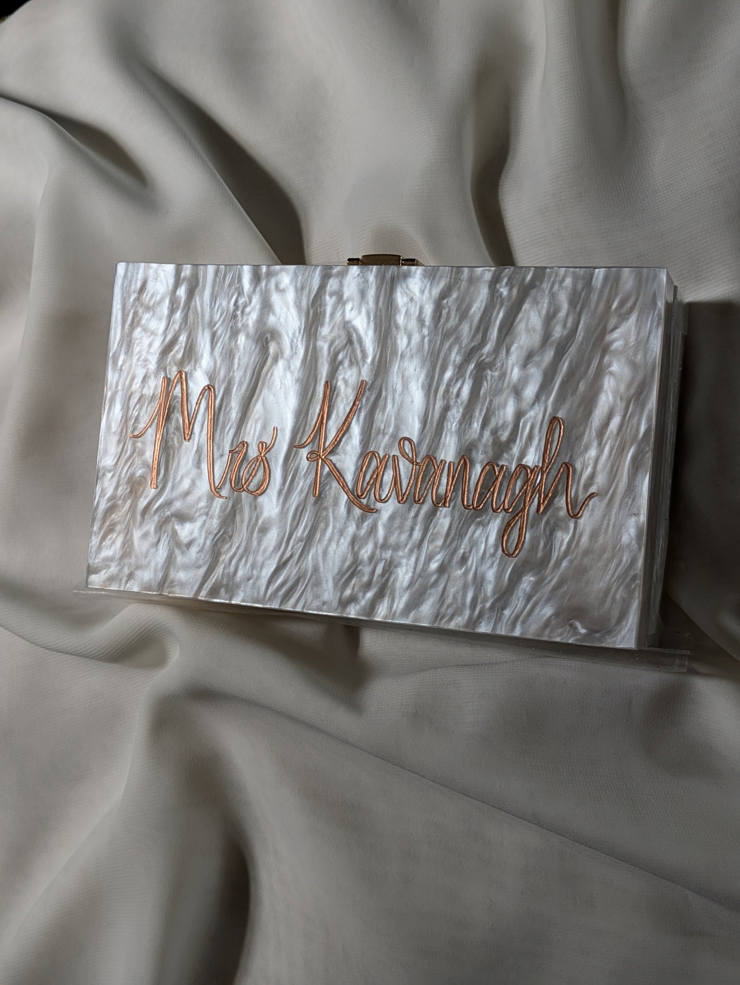 Engraved acrylic clutch