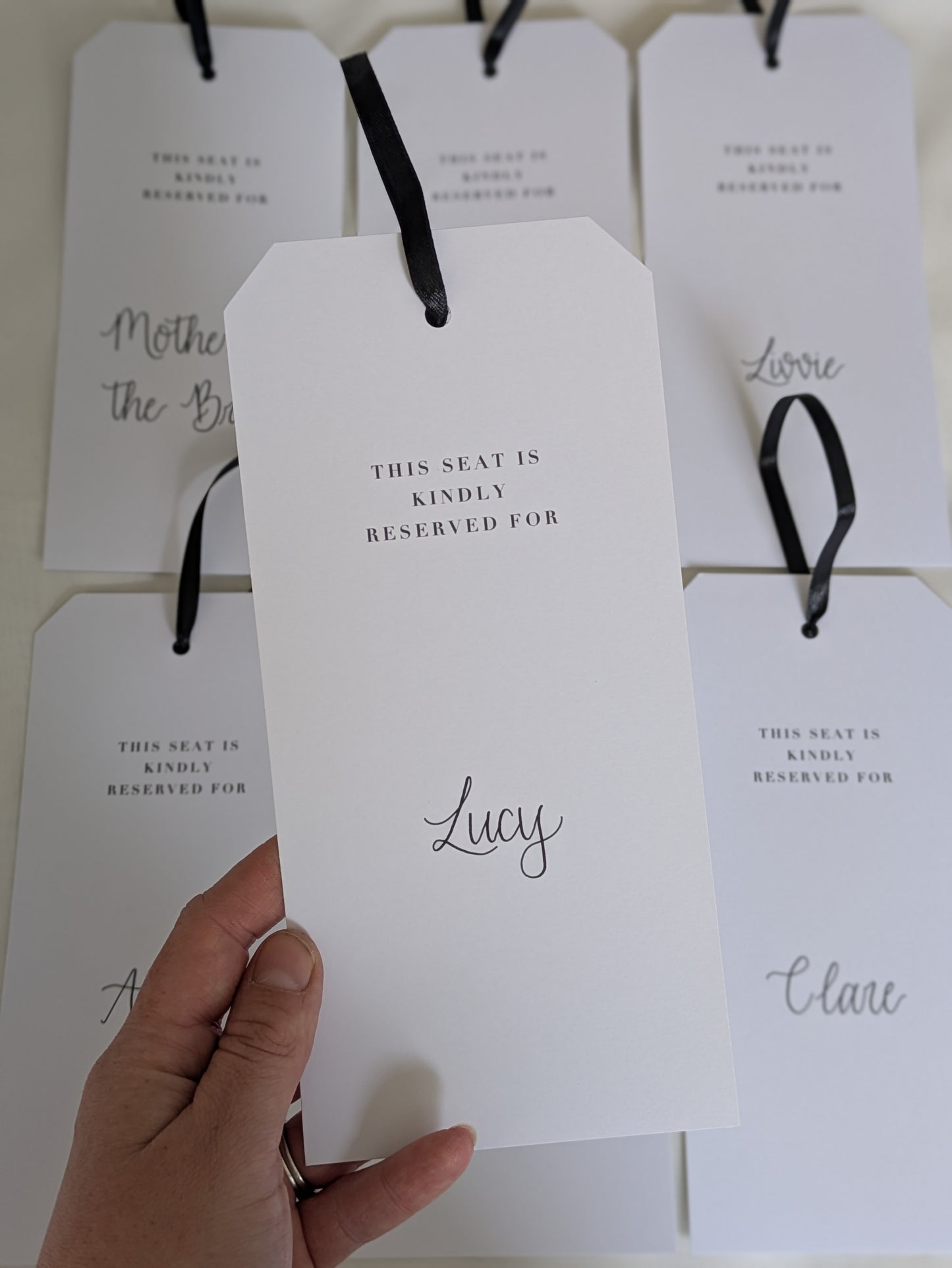 Reserved seat hanger tag